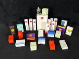 a lot of different types of cigarettes on a black background