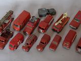 a lot of toy fire trucks that are on the table