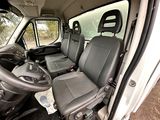 a view of the inside of a van from the driver ' s seat