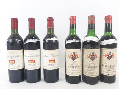 six bottles of wine are lined up in a row on a white surface