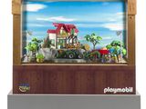 une vitrine Playmobil contenant une scène de ferme