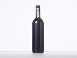 a bottle of wine sitting on a table with a white background