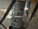 a close up view of a bicycle with a chain link