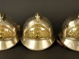 three helmets that are sitting next to each other