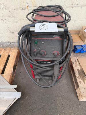 an image of a welding machine sitting on top of a pallet