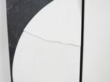 a white surfboard with a black and white design on it