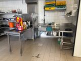 a kitchen with a lot of counter space in it
