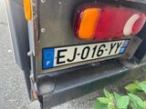 a close up of a license plate on the back of a truck