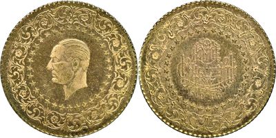 a gold coin with a portrait of a man on it