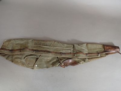 a bag that is sitting on a table with a knife