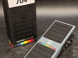 a pedal pedal sitting next to a box with a clock on it