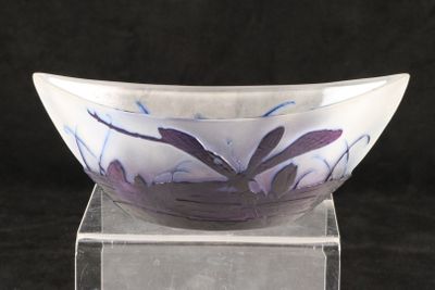 a glass bowl that is sitting on top of a stand