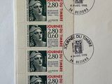 a picture of a postcard with some stamps on it