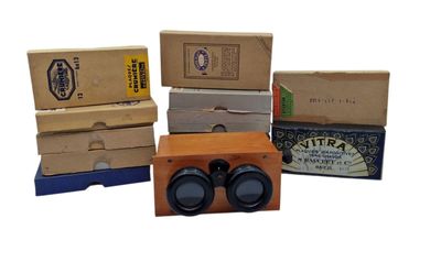 several boxes of different types of binoculars are stacked on top of each other