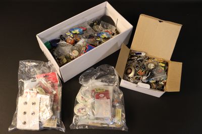 boxes of assorted items are sitting on a table in a room