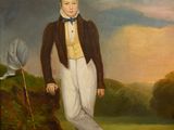 portrait of a boy in a brown jacket and white pants with a bird on a stick
