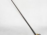 an old sword with a wooden handle on a white surface