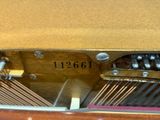 a close up of a musical box with a number on it
