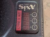 a close up of a cell phone sitting on the ground