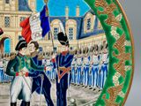 a plate with a picture of a military parade on it