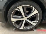 a close up of a tire on a car ' s rim