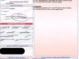 un gros plan d'un document sur lequel figure la photo d'une personne