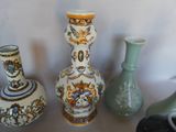 three vases that are sitting on a table