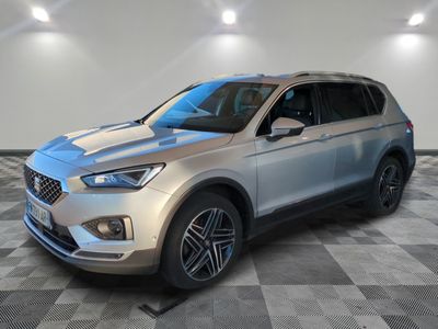 a silver 2020 ford escape is shown in a showroom