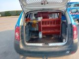 a car with the back door open and a bench in the back