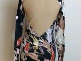 the back of a dress on a mannequin mannequin mannequin mannequin mannequin mannequin mannequin mannequin mann