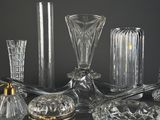 a lot of glass items that are sitting on a table