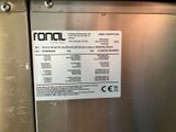 a label on the side of a stainless steel refrigerator