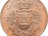 une image représentant une médaille de bronze surmontée d'une couronne