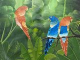 deux oiseaux perchés sur une branche dans la jungle