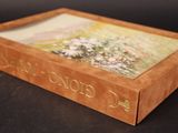 an image of a box with a picture of flowers inside of it