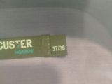 a close up of a close up of a label on a shirt