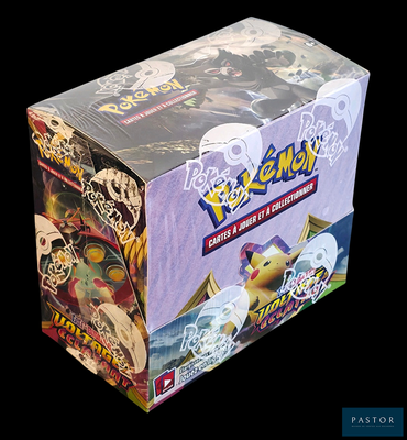 a box of pokemon trading cards on a black background