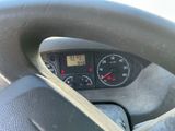 steering wheel of a car with a speedometer and gauges