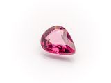 a pink tourmaline gems on a white background