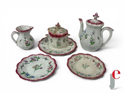 four pieces of china on a white table