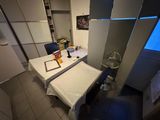 an image of a kitchen with a sink and a refrigerator