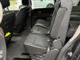 the interior of a car with two seats and a steering wheel
