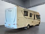 an image of a motorhome parked in a garage