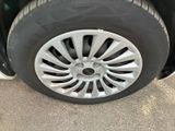 a close up of a tire on a car ' s rim