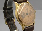 an image of a wrist watch with a brown leather band