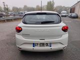 a white car that is parked in a parking lot