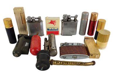 many different types of lighters and lighters on the table