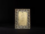 an old silver picture frame with a carved design on it