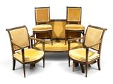 four chairs and a table in a circle on a white background