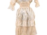 an image of a white dress on a mannequin stand